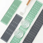 tapis vaisselle silicone anti dérapant moderne vert clair gris rayures horizontales durable clips