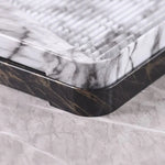 assiettes marbrées modernes élégantes lignes dorées noir blanc thé maison salon