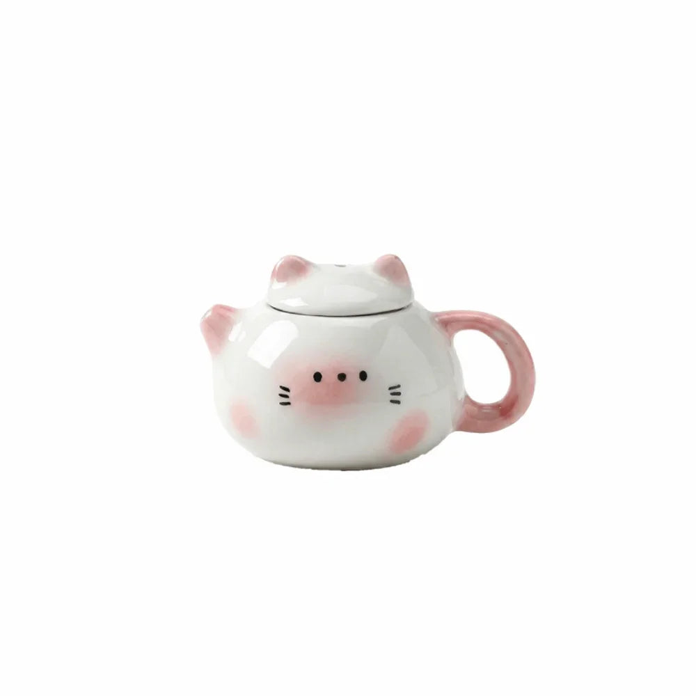 théière forme chat blanc orange rose visage mignon oreilles pointues taches oranges decorative cartoonish