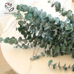 guirlande feuilles artificielles décoration intérieure vase verre bouquet fleurs séchées naturel minimaliste vert foncé
