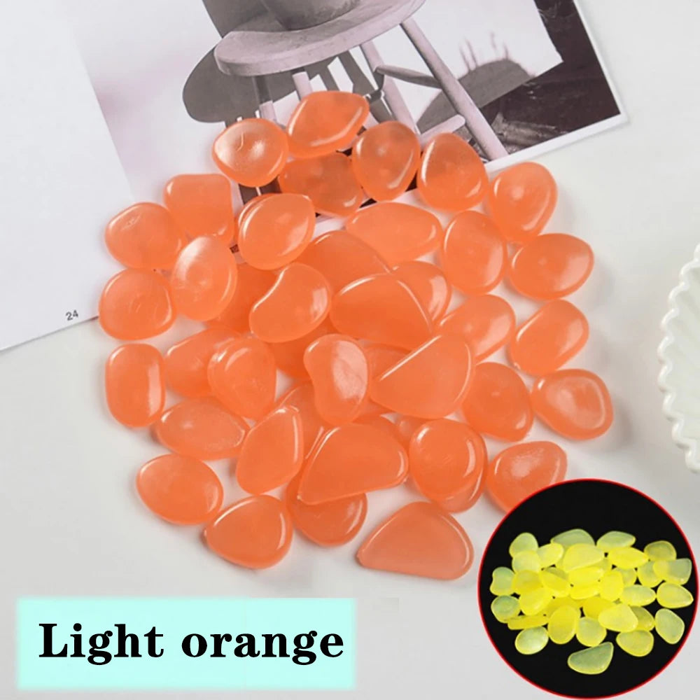 pierres fluorescentes bleu vert jaune rose modernes lisses jardin patio décor lumineux