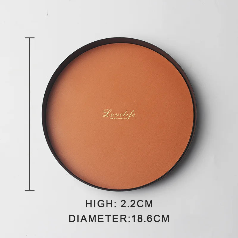 présentoir rond moderne plateau uni vert foncé orange noir maquillage soins parfums cosmétiques table