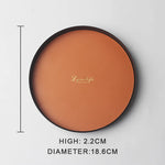 présentoir rond moderne plateau uni vert foncé orange noir maquillage soins parfums cosmétiques table