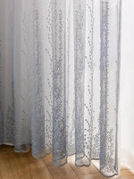 rideau voilage blanc gris dégradé motifs floraux tissu texturé translucide élégant moderne tringle dorée