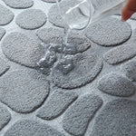 tapis bain gris clair texture cailloux moderne adhésif 150x45cm polyester absorbant