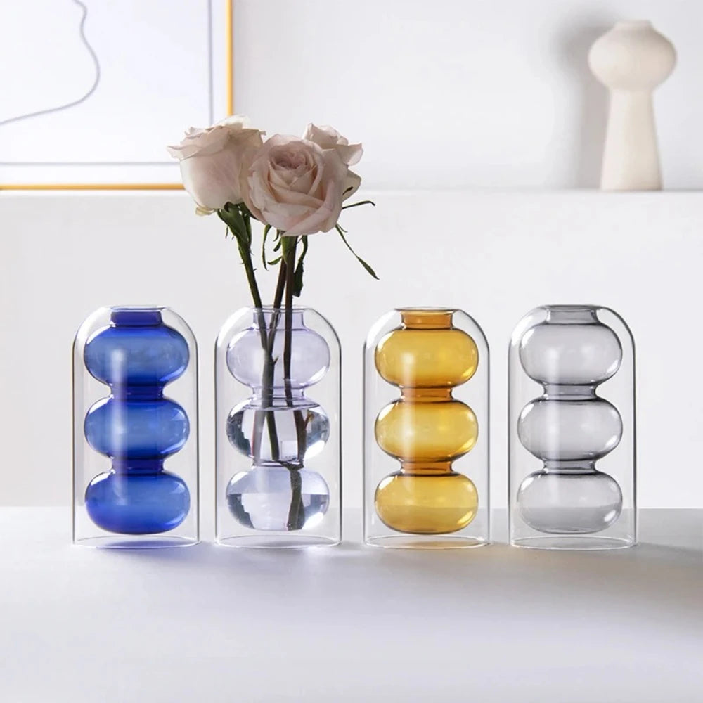 vase verre moderne bleu jaune gris violet transparent sphères empilées décoration maison plante artificielle