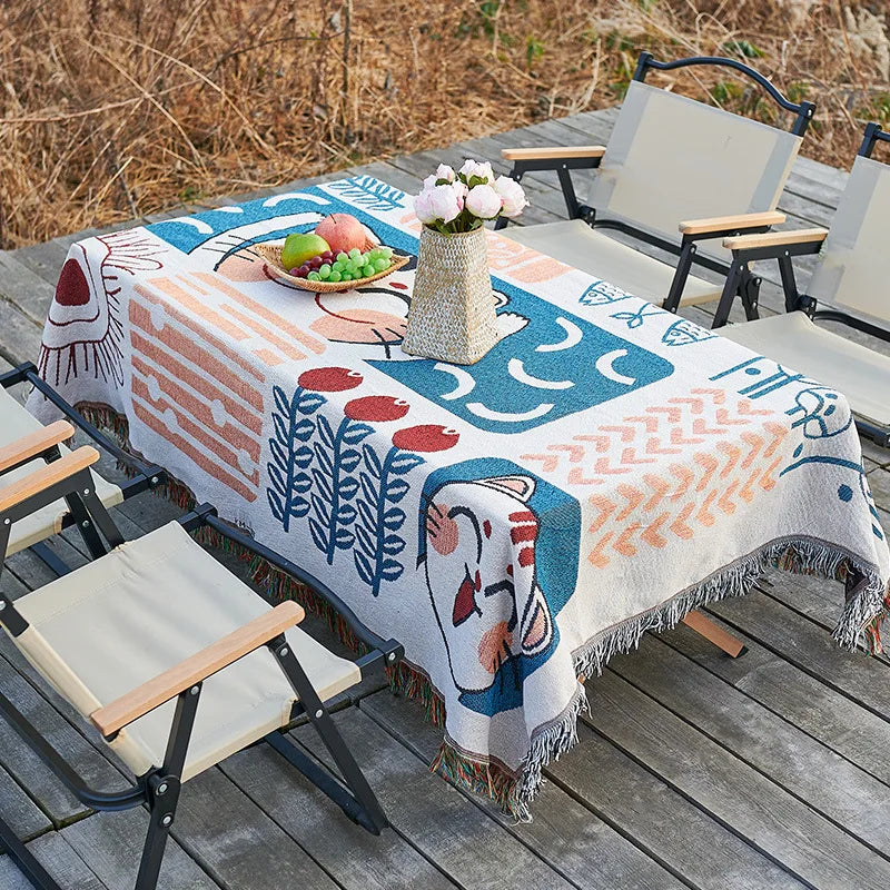 serviette table moderne ethnique motifs géométriques franges couleurs vives blanc bleu orange rouge noir