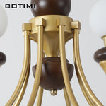 lustres modernes chandelier or marron foncé ampoules led globes opaques éléments décoratifs