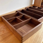 boîte compartiments bois marron foncé minimaliste respectueuse environnement réutilisable articles divers rangement moderne