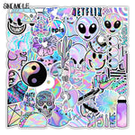 stickers holographiques assortiment violet rose bleu motifs véhicules animaux alimentos symboles personnages adhésifs