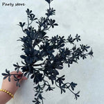 décoration intérieure moderne bouquet artificiel noir feuilles roses stylisées table maison événement party