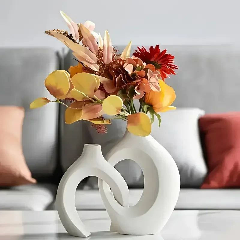 vases decoratifs blancs modernes abstraits incurves fleurs artificielles salon deco minimaliste sculptural