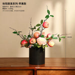 décoration intérieure moderne fleurs artificielles vase noir roses arrondies éléments dorés asiatique