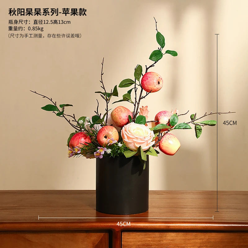 décoration intérieure moderne fleurs artificielles vase noir roses arrondies éléments dorés asiatique