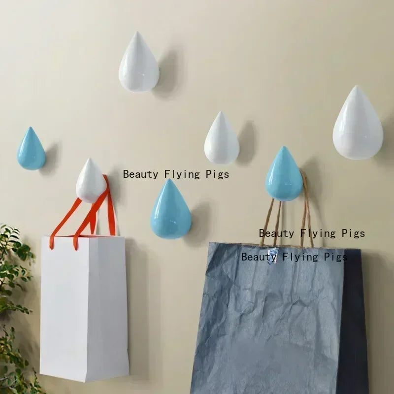 porte sacs mural moderne gouttes pluie vis fixés noir blanc rouge vert