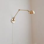 lampe murale industrielle dorée lisse fixée mur interrupteur câble électrique moderne cuisine chambre