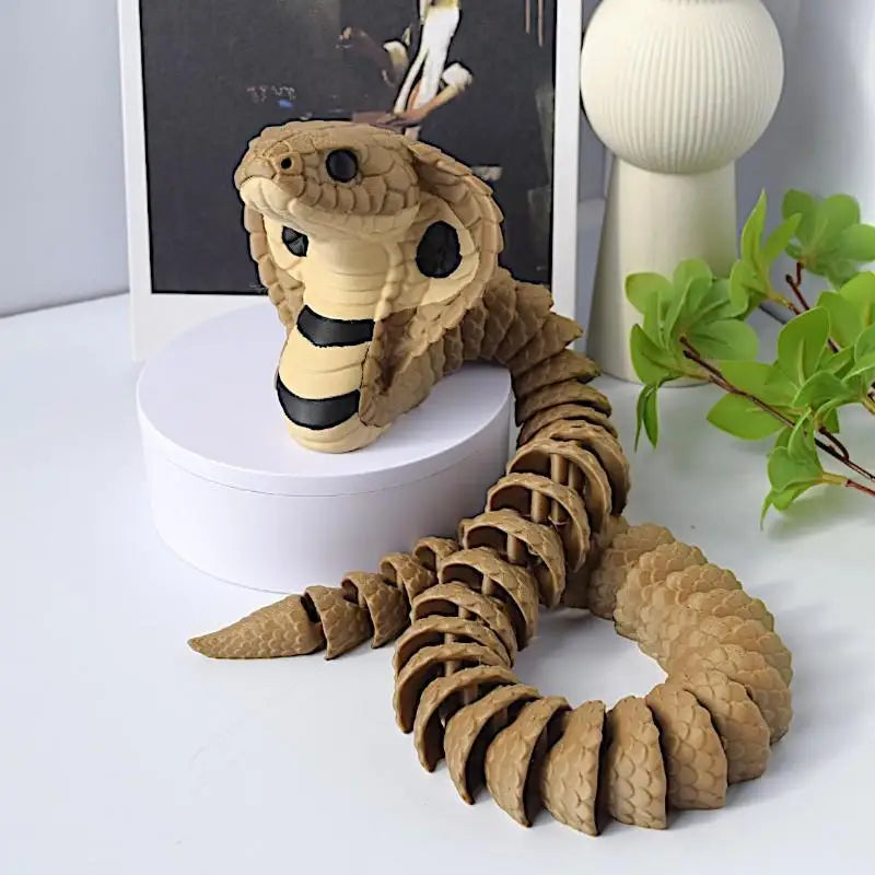jouet serpent articulé marron noir réelle 33cm décoratif imitations écailles texturées éléments fleurs livres