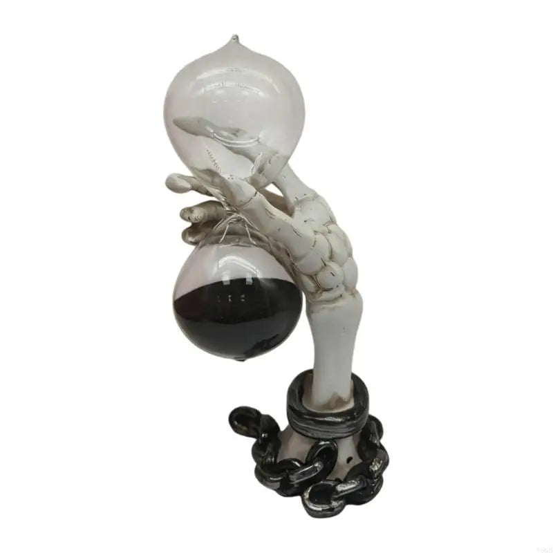 sablier mains squelettiques sable noir verre transparent gothique halloween décoration osseuse textures anciennes meubles