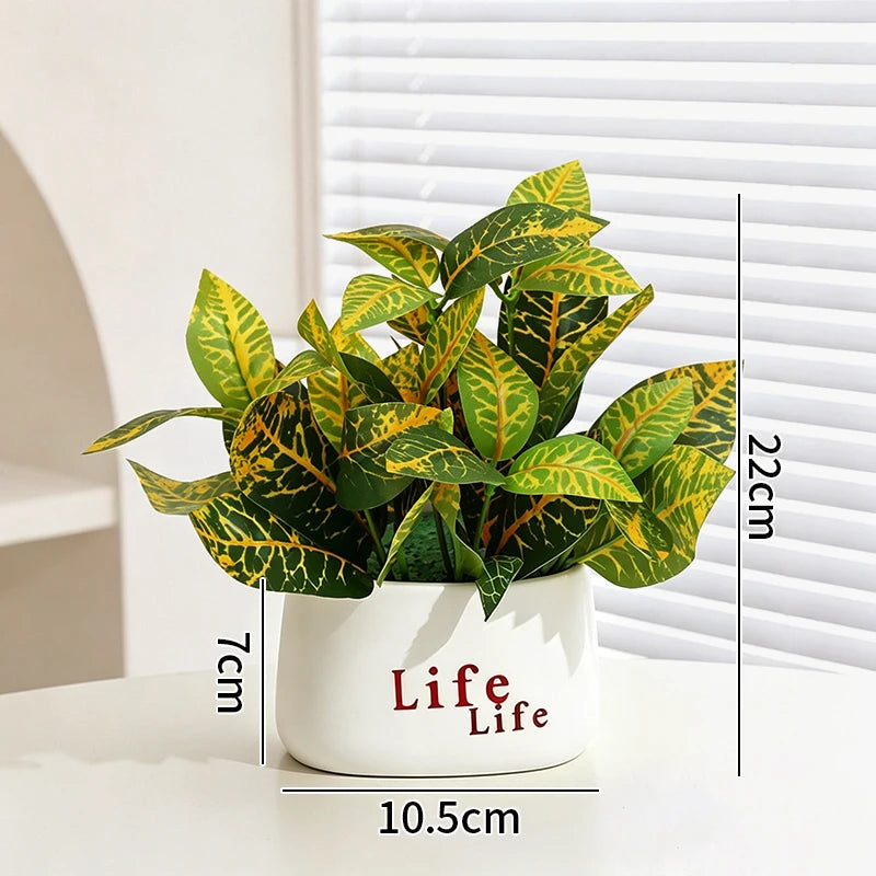 plantes artificielles vertes moderne pots blancs décoration intérieure feuilles variées minimaliste