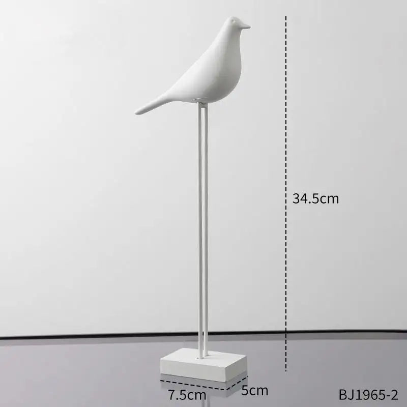 statues oiseaux noir blanc minimaliste sculpture deco intérieur base plate pieds minces