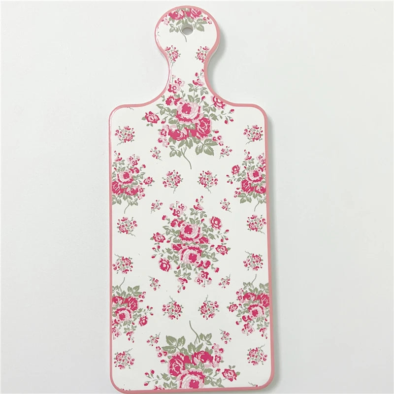 planche découper céramique vintage fleurs roses motifs géométriques blanc roseclair