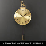 horloge murale moderne or marbrure pendule cerfs décoration élégante aiguilles métal fixations murales