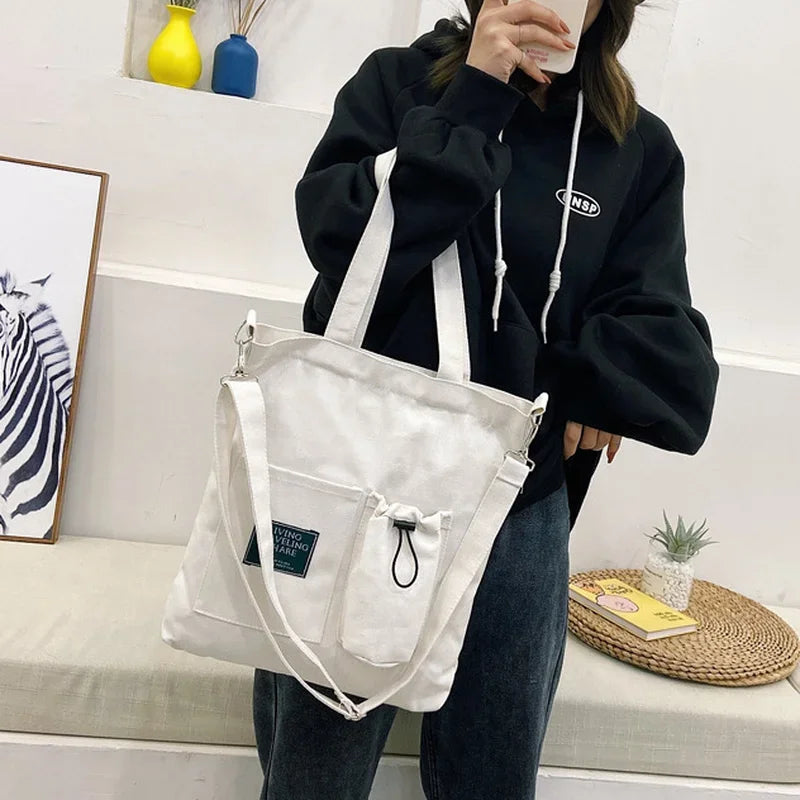 sac main uni jaune blanc vert noir moderne poignées détachables porte clés poche avant