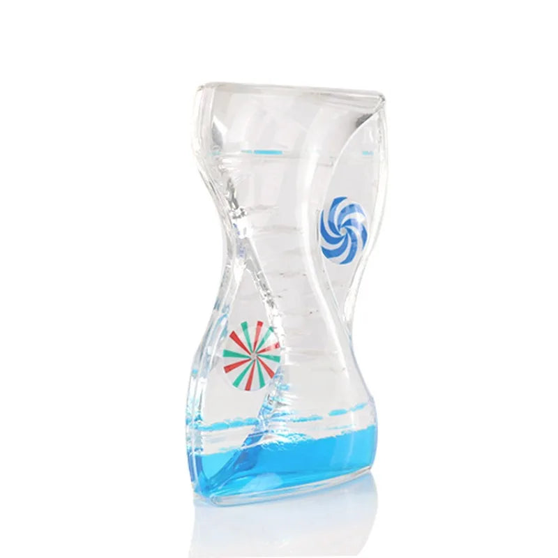 sablier liquide vert bleu transparent spirales flottantes décoration intérieure relaxante hypnotique