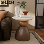 table basse ronde pierre moderne minimaliste sculptural couleur vive salon