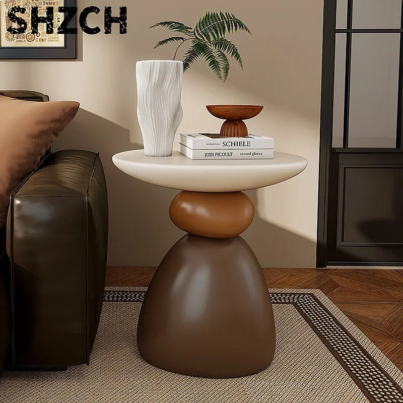 table basse ronde pierre moderne minimaliste sculptural couleur vive salon
