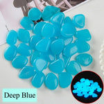 pierres fluorescentes bleu vert jaune rose modernes lisses jardin patio décor lumineux