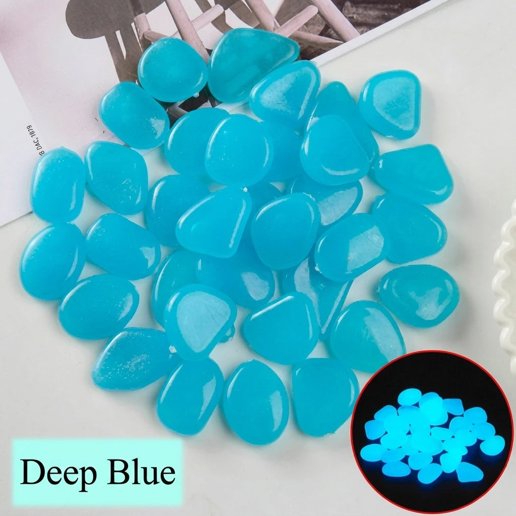pierres fluorescentes bleu vert jaune rose modernes lisses jardin patio décor lumineux
