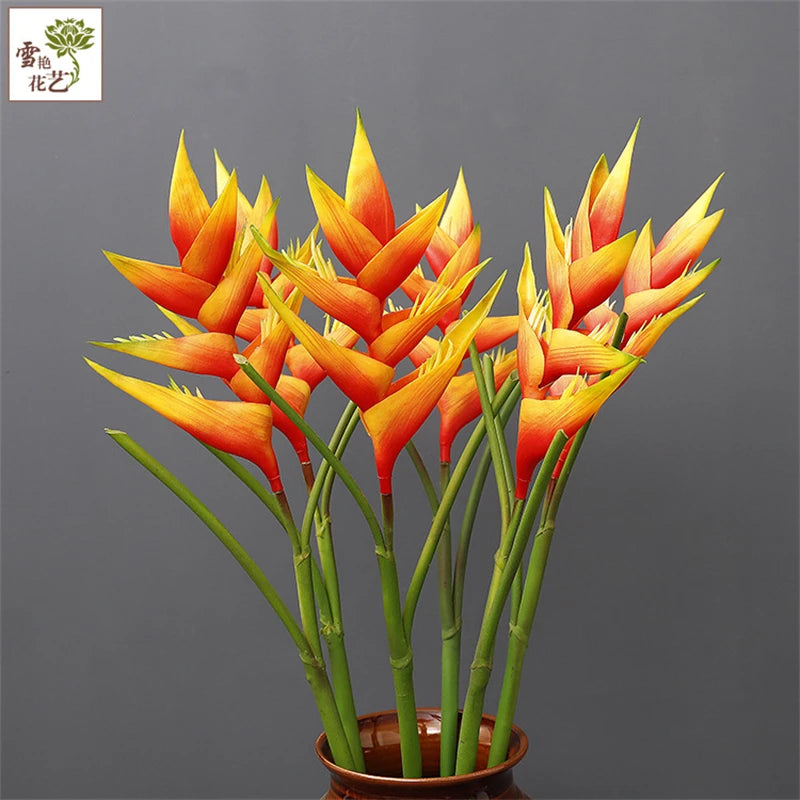 bouquet fleurs artificielles exotiques orange rouge rose violet feuilles vertes moderneintérieur décoration vase