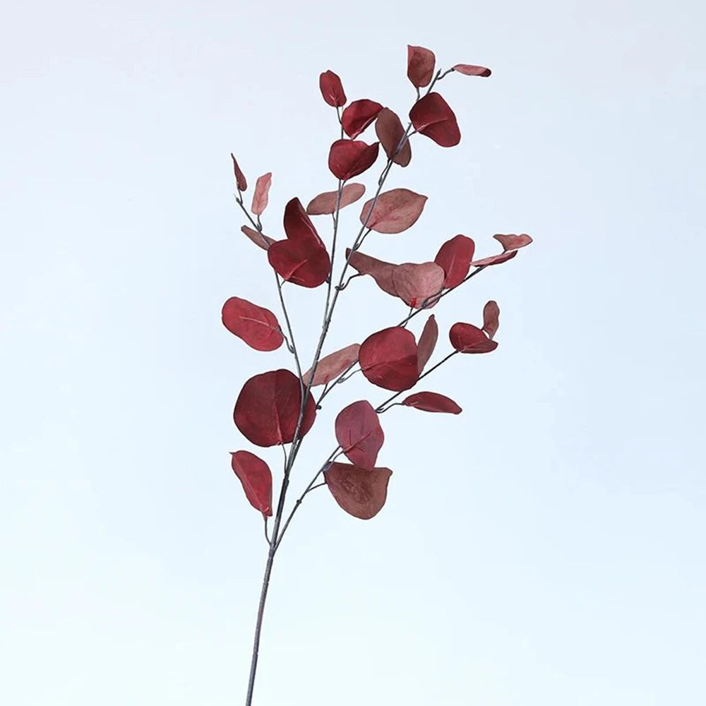 bouquet artificiel feuilles ovales moderne vase transparent support doré couleurs vives exposition intérieure