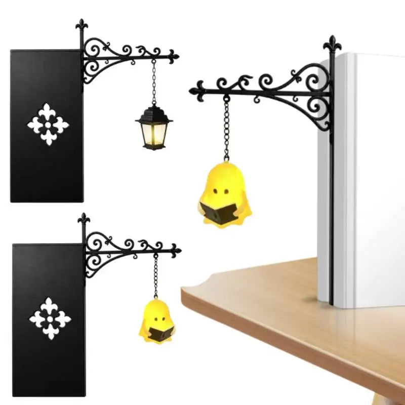 lampe décorative vintage suspendue personnage livre bras végétaux noir jaune blanc