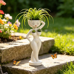 pots fleurs statuette blanche visage stylisé moderne minimaliste intérieur salon