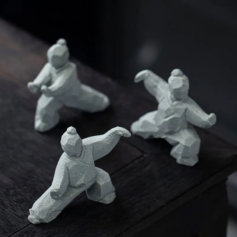 statues arts martiaux traditionnelles gris clair texture granite opaques artisanal modernes motifs traditionnels