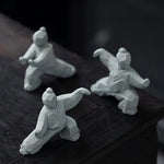 statues arts martiaux traditionnelles gris clair texture granite opaques artisanal modernes motifs traditionnels