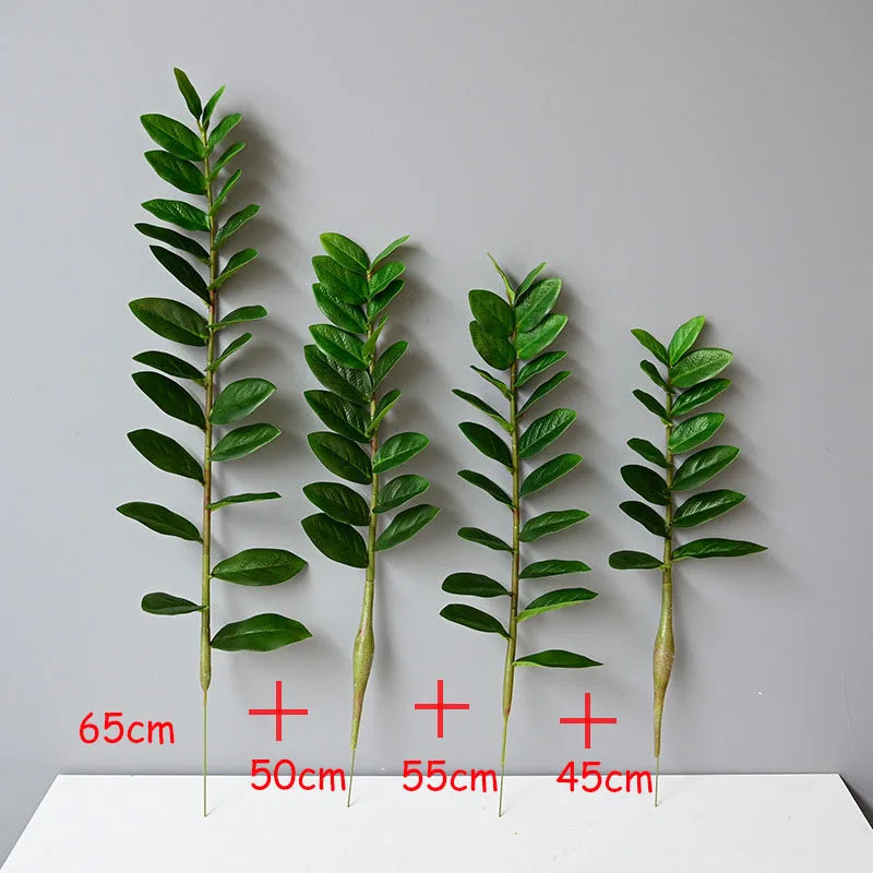 plantes artificielles branches vertes feuilles simples extérieur moderne pot blanc exposé