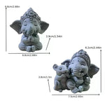 statue éléphant gris texture granulée détails sculptés artisanal maison décoration prière posé