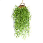 panier suspendu tressé rotin marron clair marron foncé beige clair traditionnel anneau métallique plantes