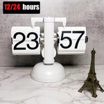 horloge cadran rotatif vintage noir blanc rétro pied circulaire chiffres noirs fond blanc