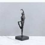 statuette ballerine moderne noire texturée socle deux livres fashion