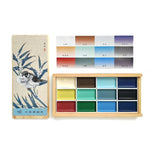 palette peinture aquarelle multicolore compartiments traditionnelle boite bois artiste illustration oiseaux