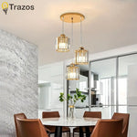 suspension lumineuse trois lumières cristal or moderne abat jour transparent chambre salon contemporain