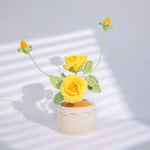 décoration maison bouquet fleurs tricotées artisanale violet jaune bleu roseclair vert
