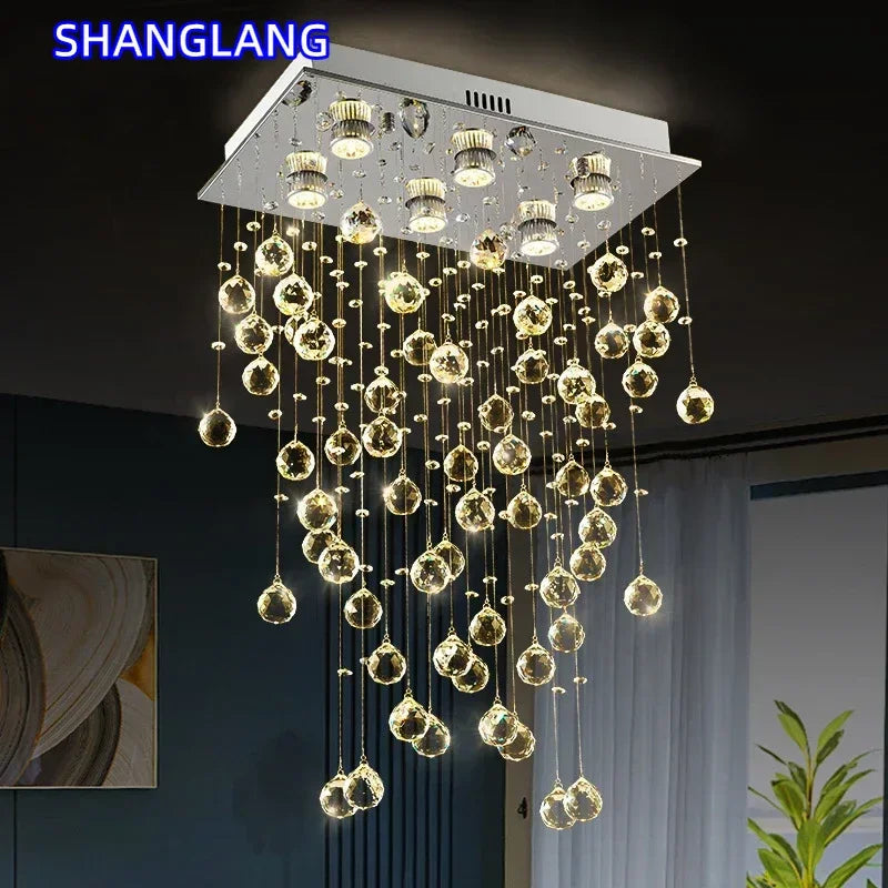 suspension lumineuse moderne transparente cristal brillantes élégante dorée fixations invisibles chaînes incluses