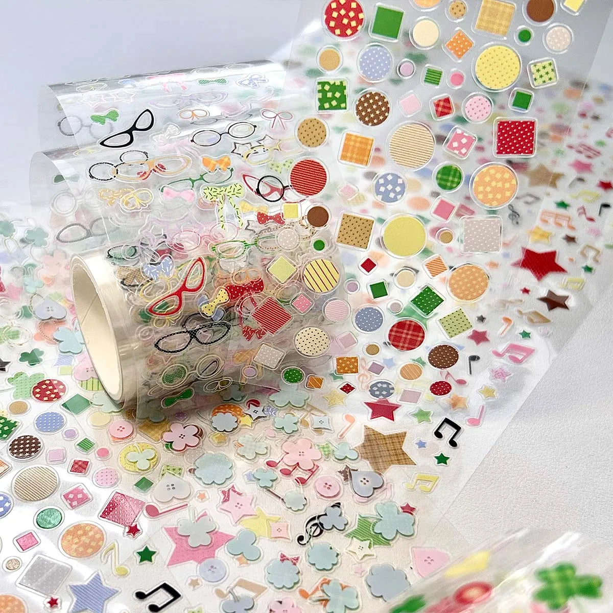 rubans autocollants transparents multicolores étoiles notes musicales cercles coeurs enfantins