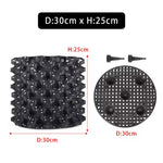 grille drainage plante noir moderne perforations circulaires différentes tailles incluses