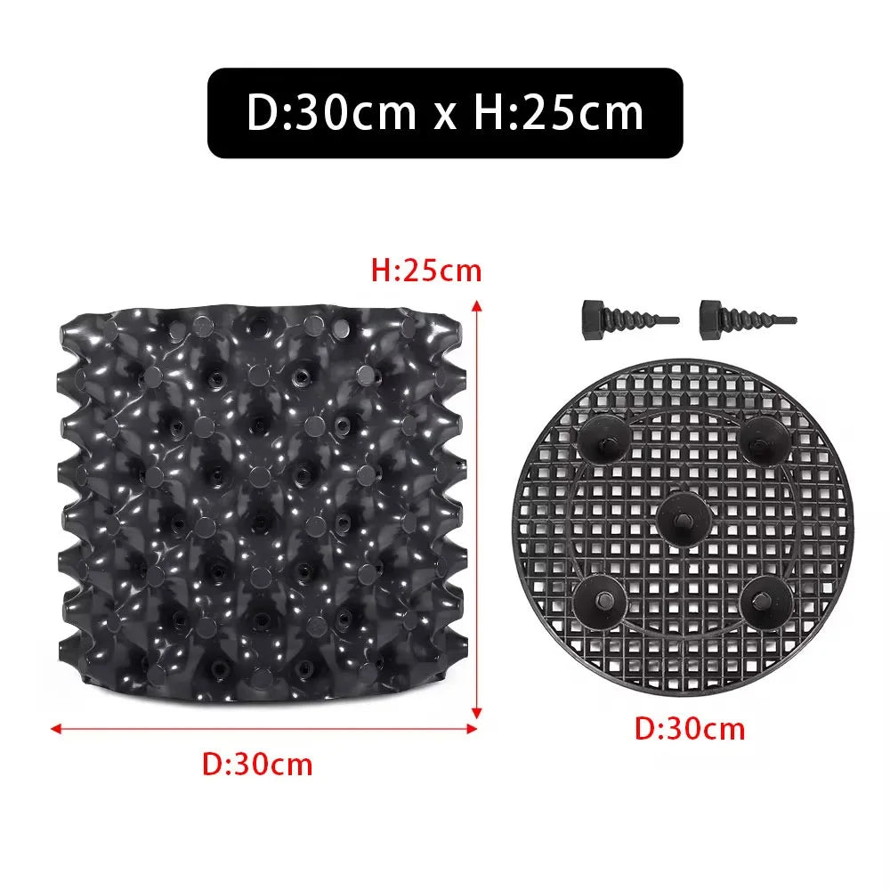 grille drainage plante noir moderne perforations circulaires différentes tailles incluses